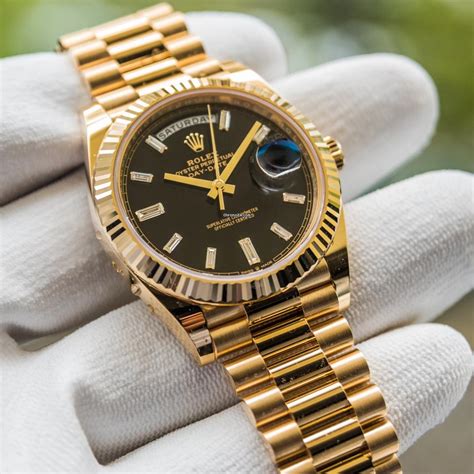 rolex day date gold black dial on hand|rolex day date 40 228235.